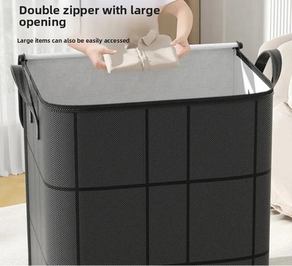 Person using a large gray laundry basket with a double zipper and large opening.