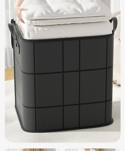 Black woven storage basket on a white surface