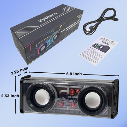 Vythora speaker with packaging, cable, and manual on a blue background