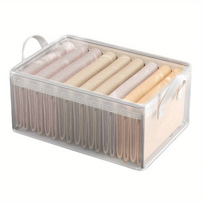 Clear storage box with rolled-up towels inside on a white background
