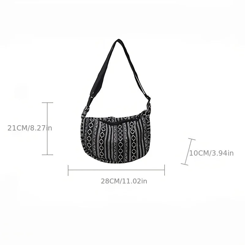 Black and white patterned handbag with measurements on a white background