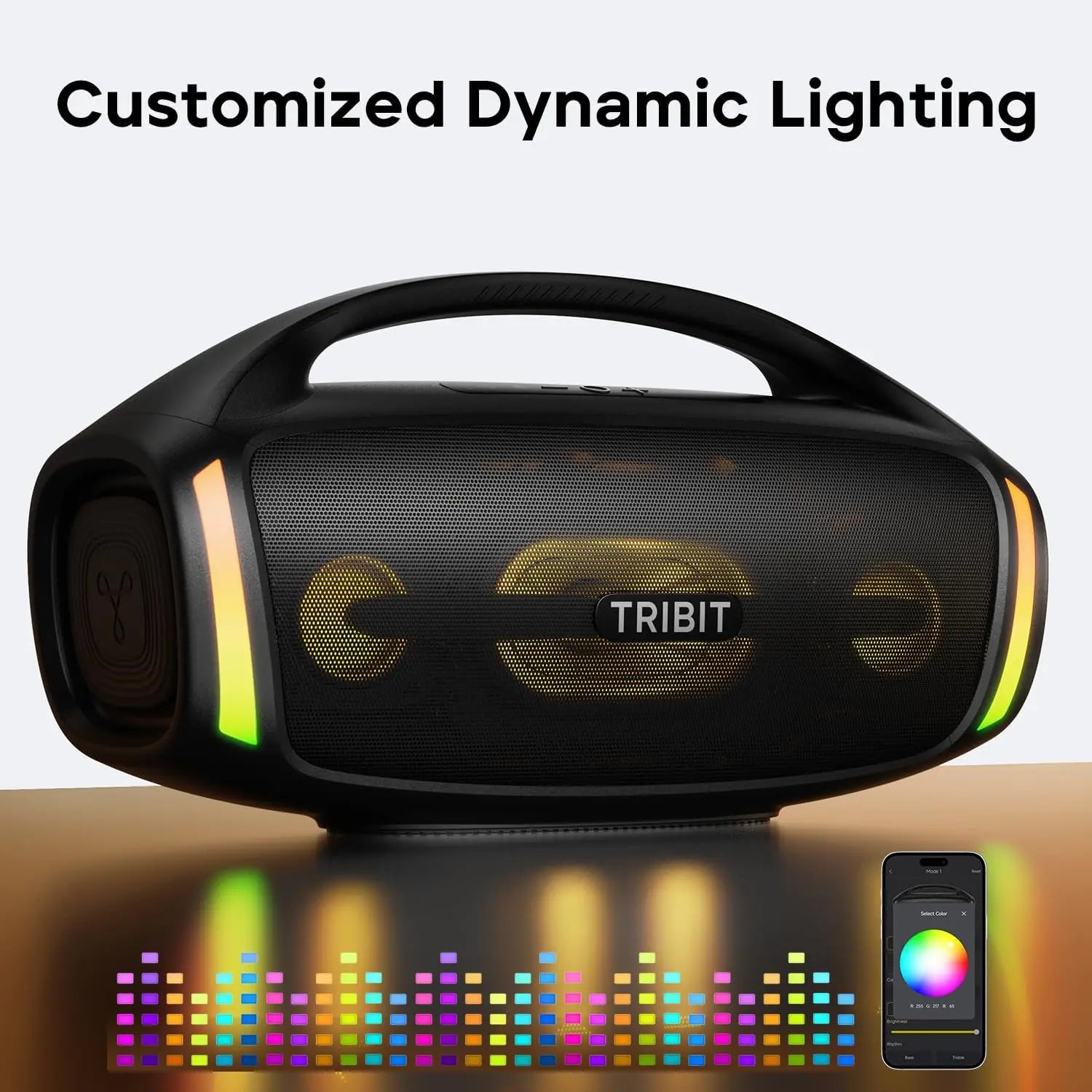 Black Tribit speaker with colorful dynamic lighting effects on a reflective surface.