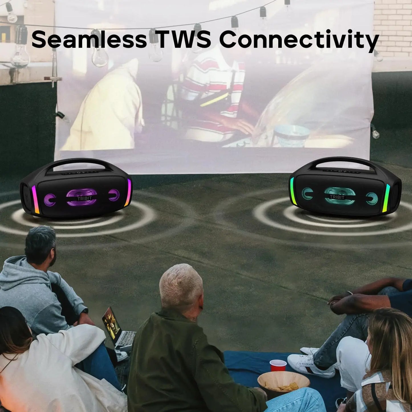 Two wireless speakers with colorful LED lights on a screen displaying 'Seamless TWS Connectivity'.