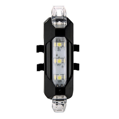 Black bike light with clear lens on a white background