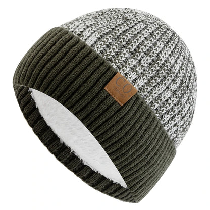Knitted beanie with two-tone design on a white background