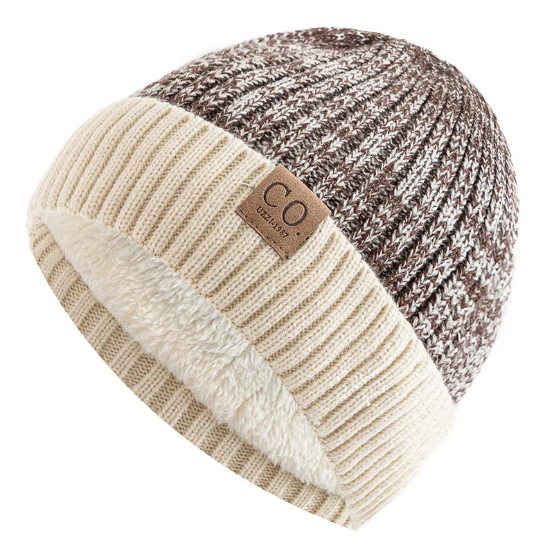 Knitted beanie with two-tone design and brand logo on a white background