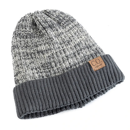 Gray and black marbled knit beanie with a brown leather patch on a white background