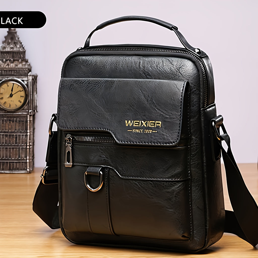 Black leather bag with visible brand name on a wooden surface
