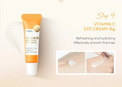 Vitamin C eye cream tube with application instructions on a beige background
