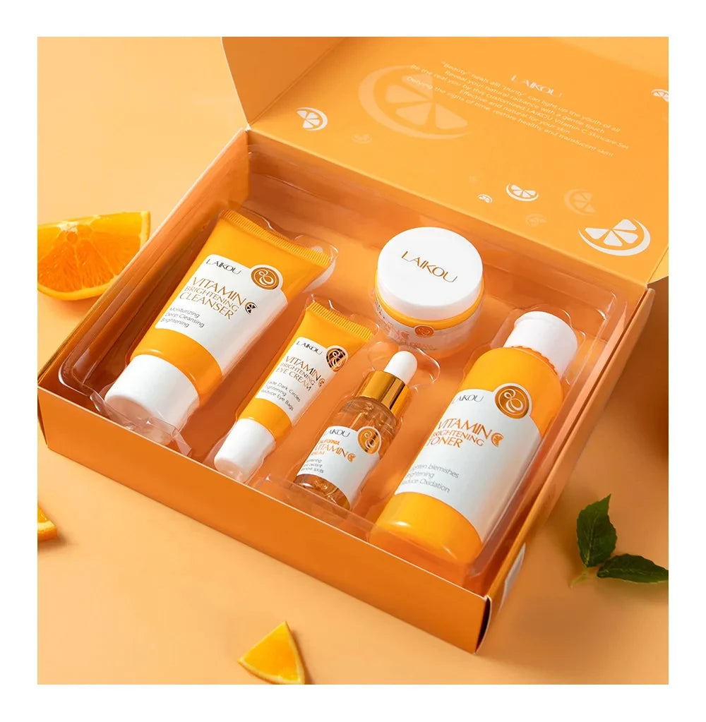Skincare product set with orange packaging on a matching background