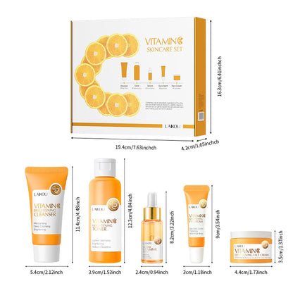 Vitamin C skincare set with packaging, cleanser, serum, and cream on a white background