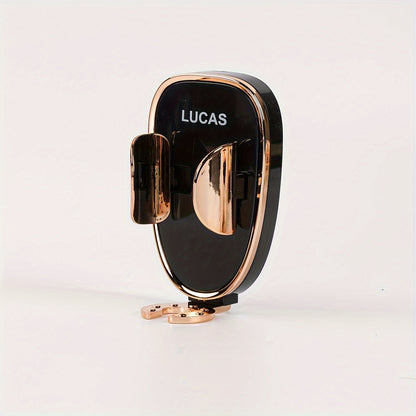 Black and rose gold phone holder with 'LUCAS' branding on a light gray background