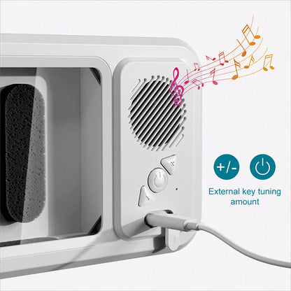 White electronic device with speaker and control buttons on a white background