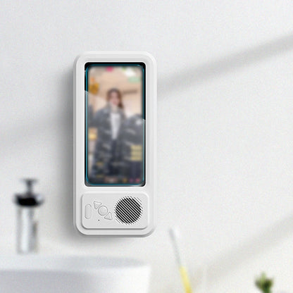 Digital doorbell displaying a person on a screen against a white wall.