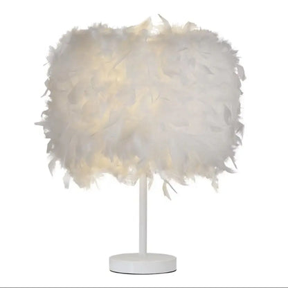 White feathered table lamp on a white background