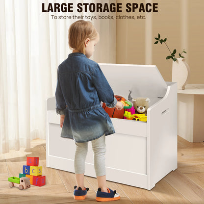 Child standing next to a white toy storage unit with colorful toys on a wooden floor.