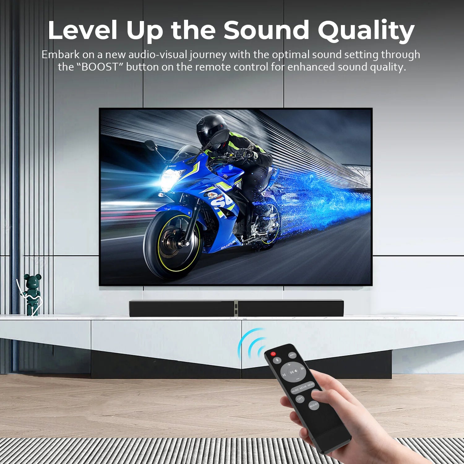 TV screen displaying a motorcycle graphic with a remote control held by a hand, emphasizing enhanced sound quality.