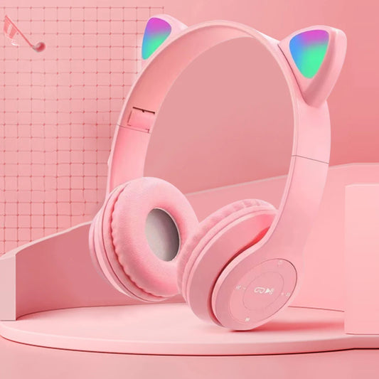 Pink headphones with cat ears on a pink background