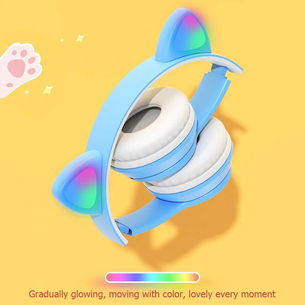 Blue headphones with cat ears on a yellow background