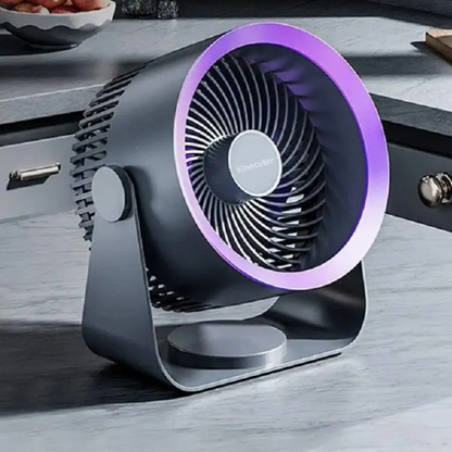 Portable fan with purple accents on a wooden surface
