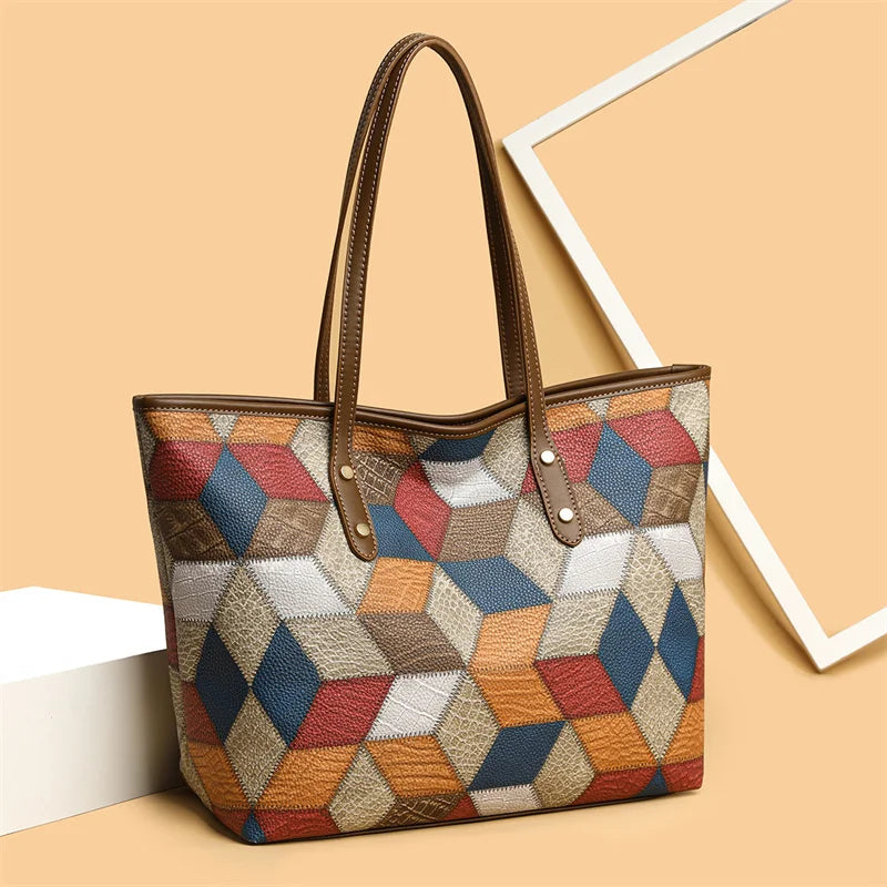 Multicolored geometric patterned handbag on a beige background