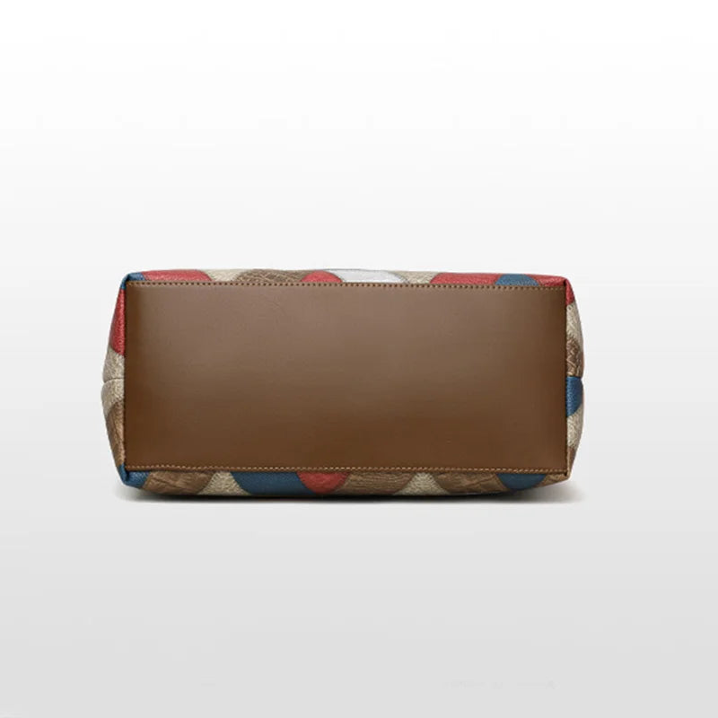 Brown clutch bag with colorful pattern on a white background