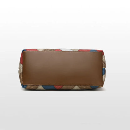 Brown clutch bag with colorful pattern on a white background