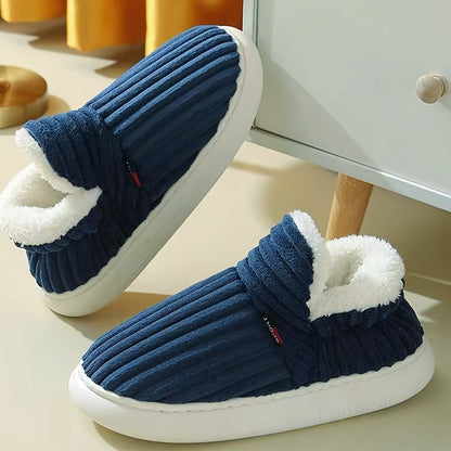 Blue and white slippers on a light wooden floor.