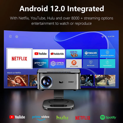 Smart TV with streaming apps and a projector in front, displaying Android 12.0 integration.